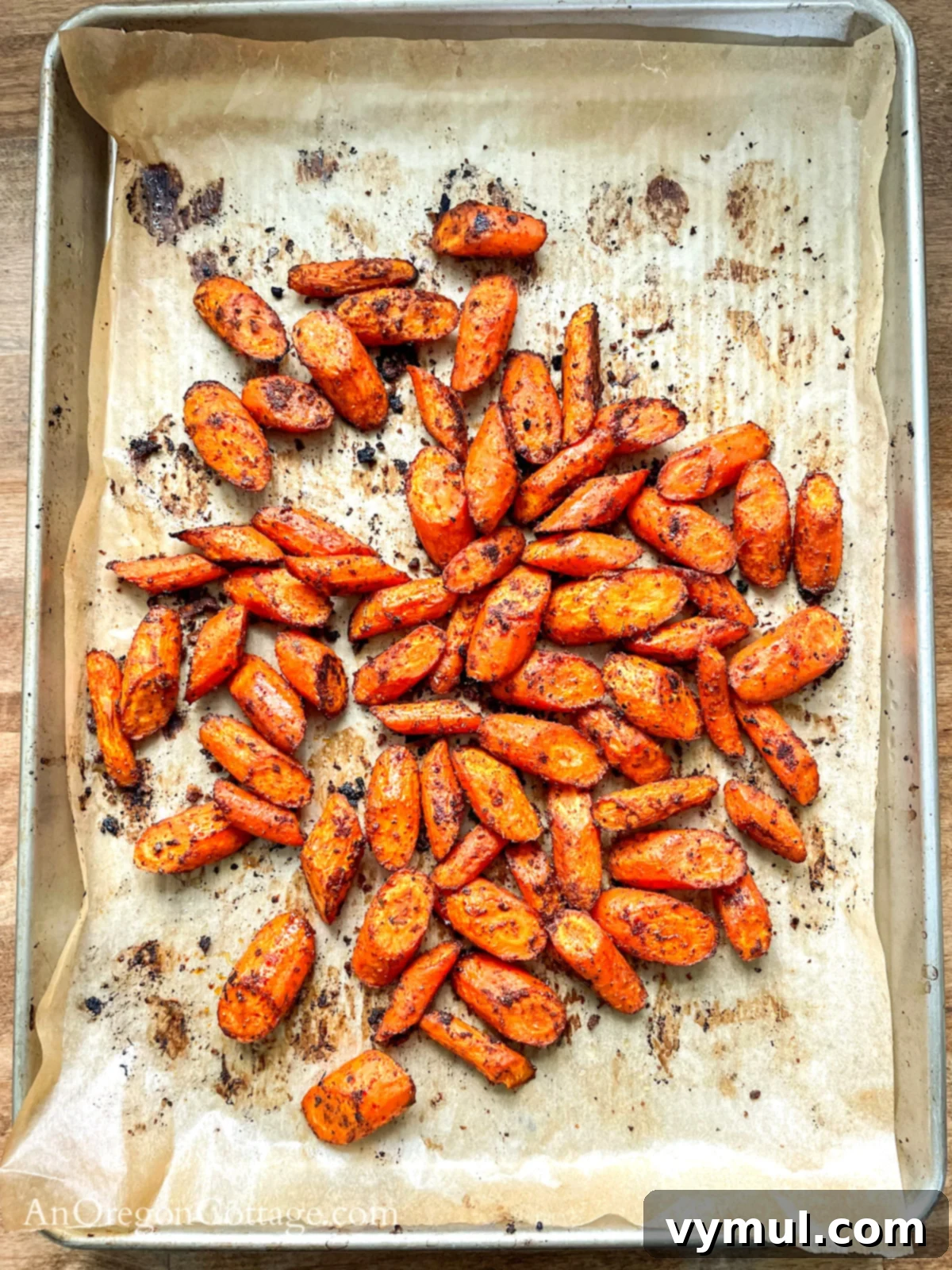 Irresistible Garlic Spiced Roasted Carrots 6 spice roasted carrots on baking sheet