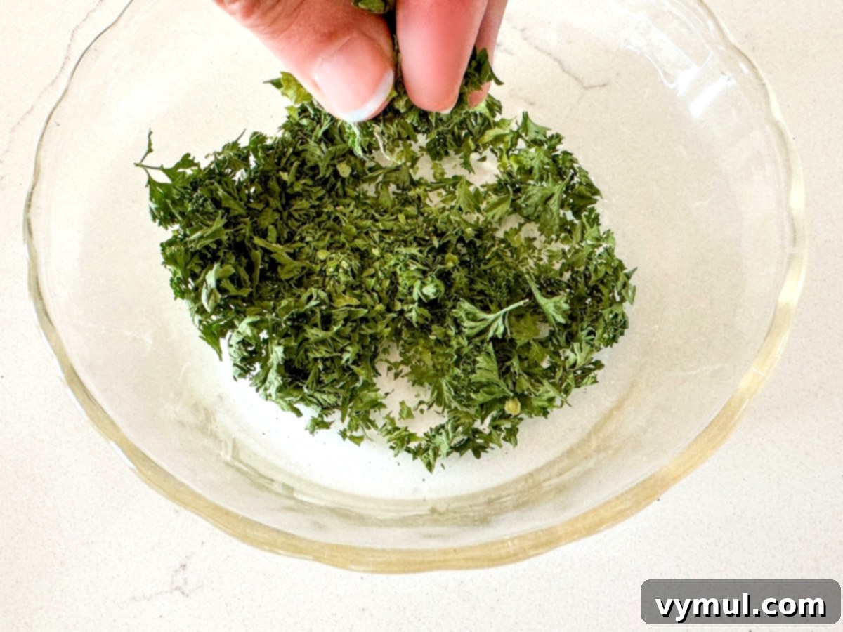 Drying Parsley Made Simple Oven Dehydrator Air 8 crumbling dry parsley leaves in a bowl