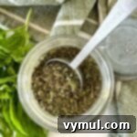 Drying Parsley Made Simple Oven Dehydrator Air 10 jar of dried parsley with a teaspoon