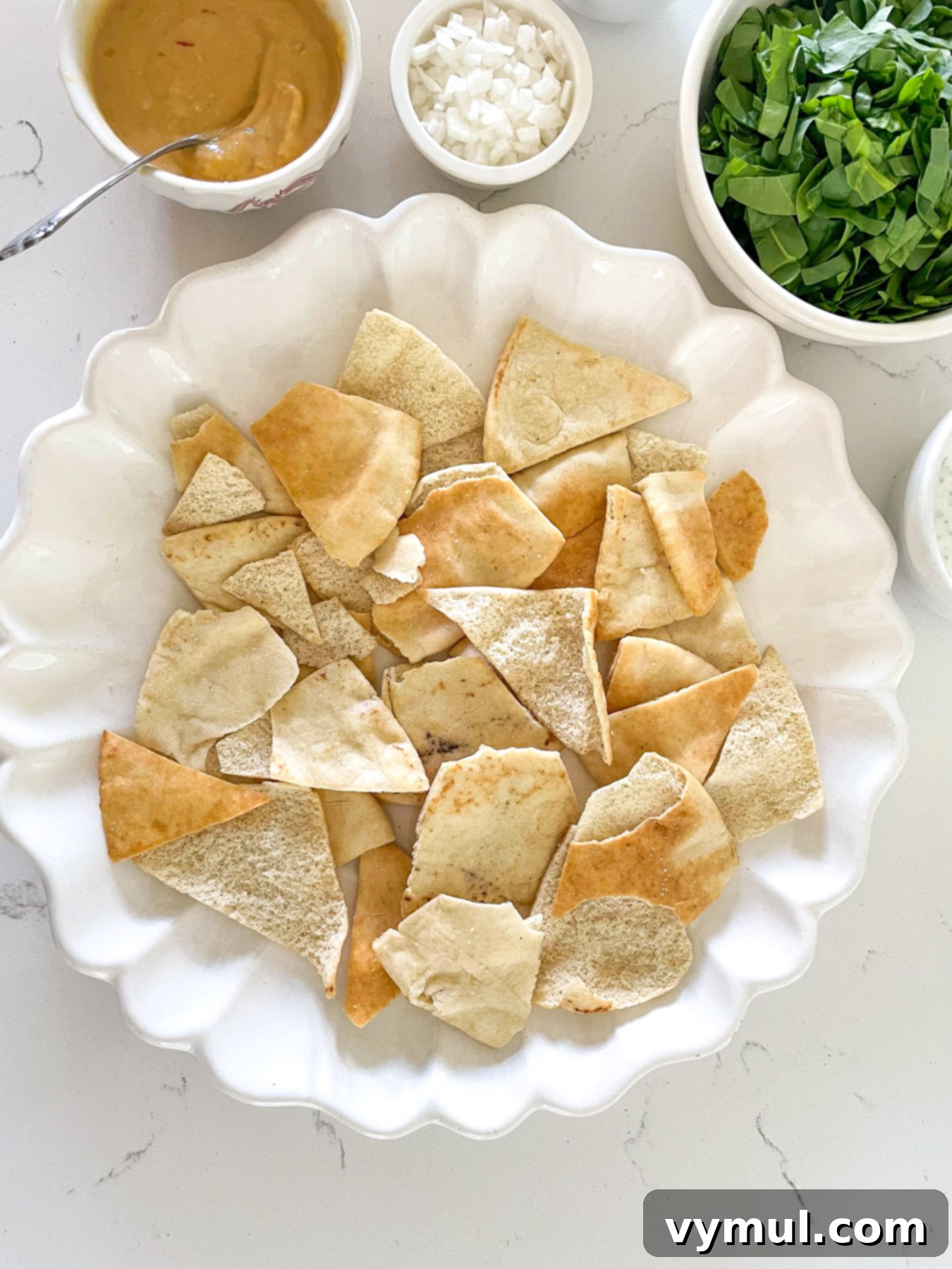 15-Minute No-Bake Greek Nachos 5 pita chip layer on platter