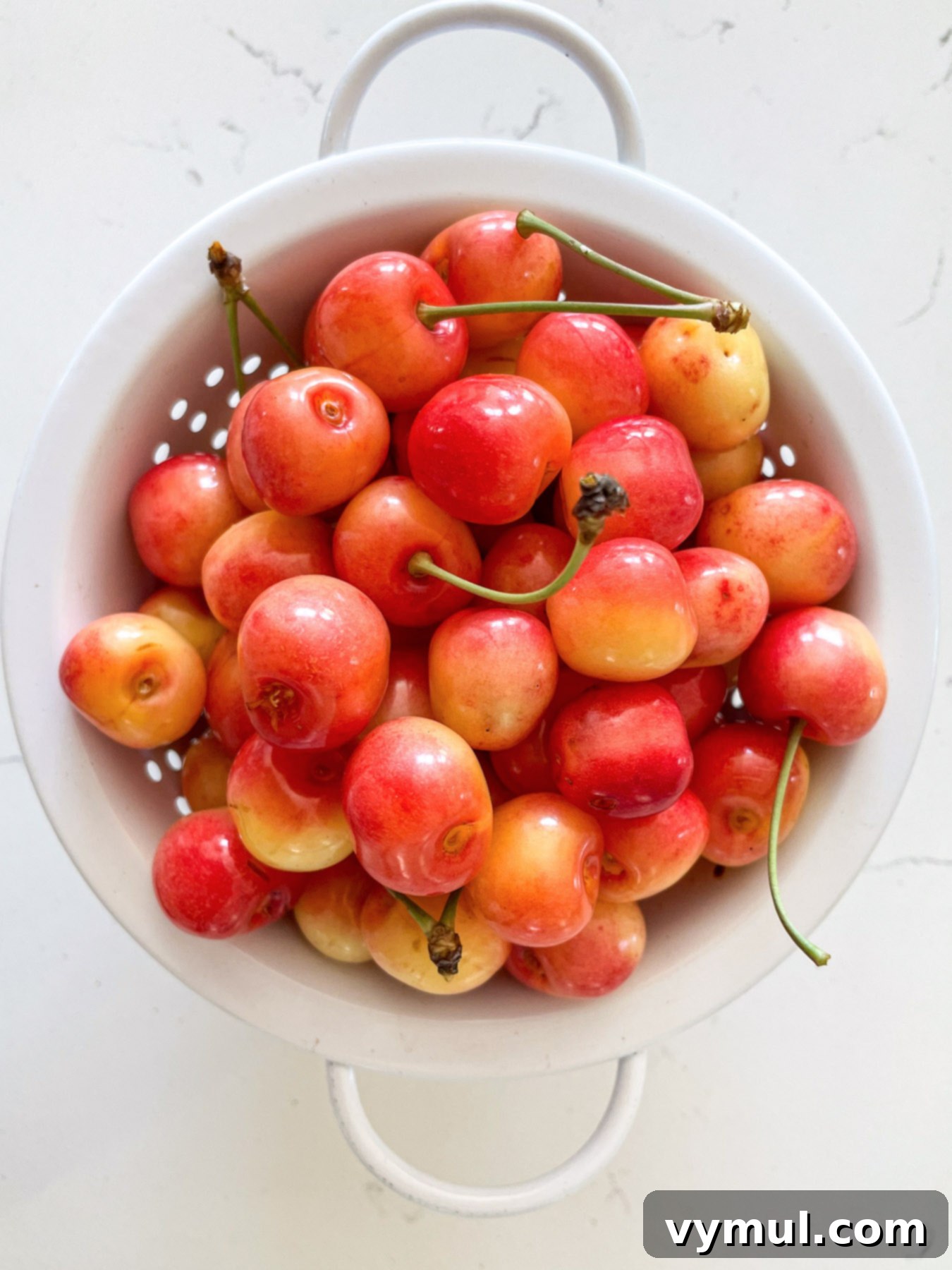 Sweet Cherry, Feta & Walnut Medley 3 Royal Anne/Rainier cherries in white colander above
