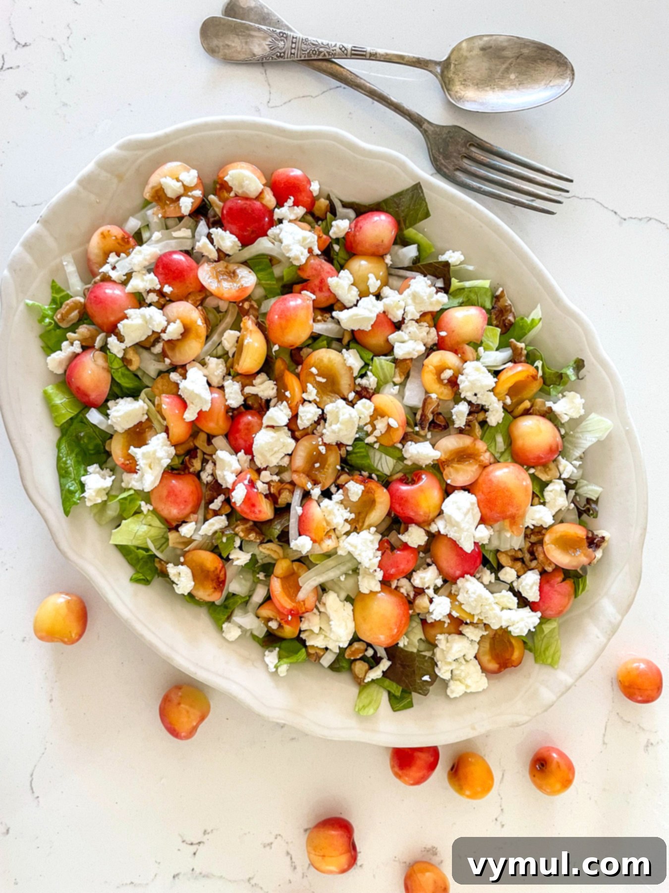 Sweet Cherry, Feta & Walnut Medley 7 adding feta to salad layers on platter