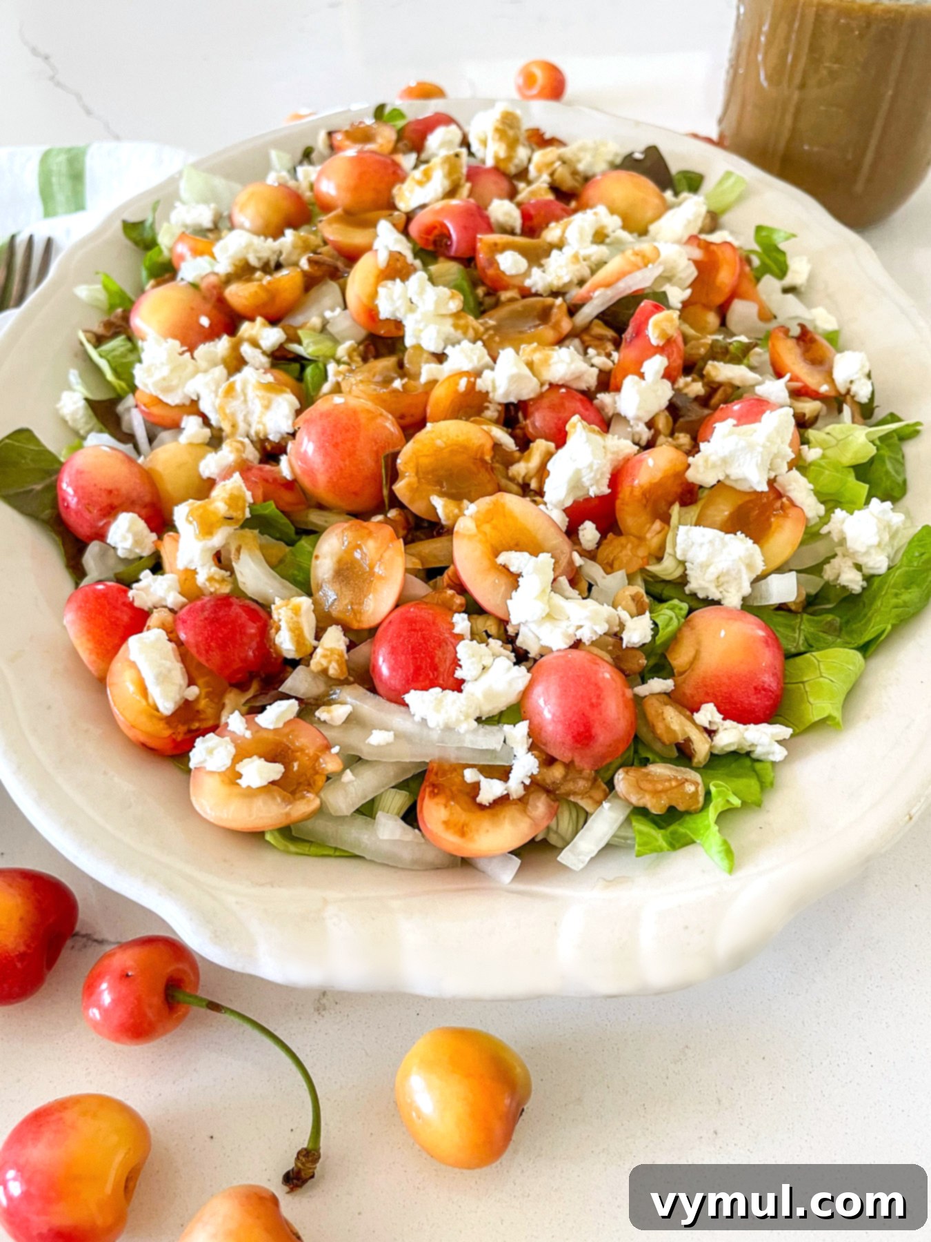 Sweet Cherry, Feta & Walnut Medley 9 cherry salad on platter dressed with balsamic vinaigrette
