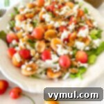 Sweet Cherry, Feta & Walnut Medley 10 cherry salad on platter dressed with balsamic vinaigrette