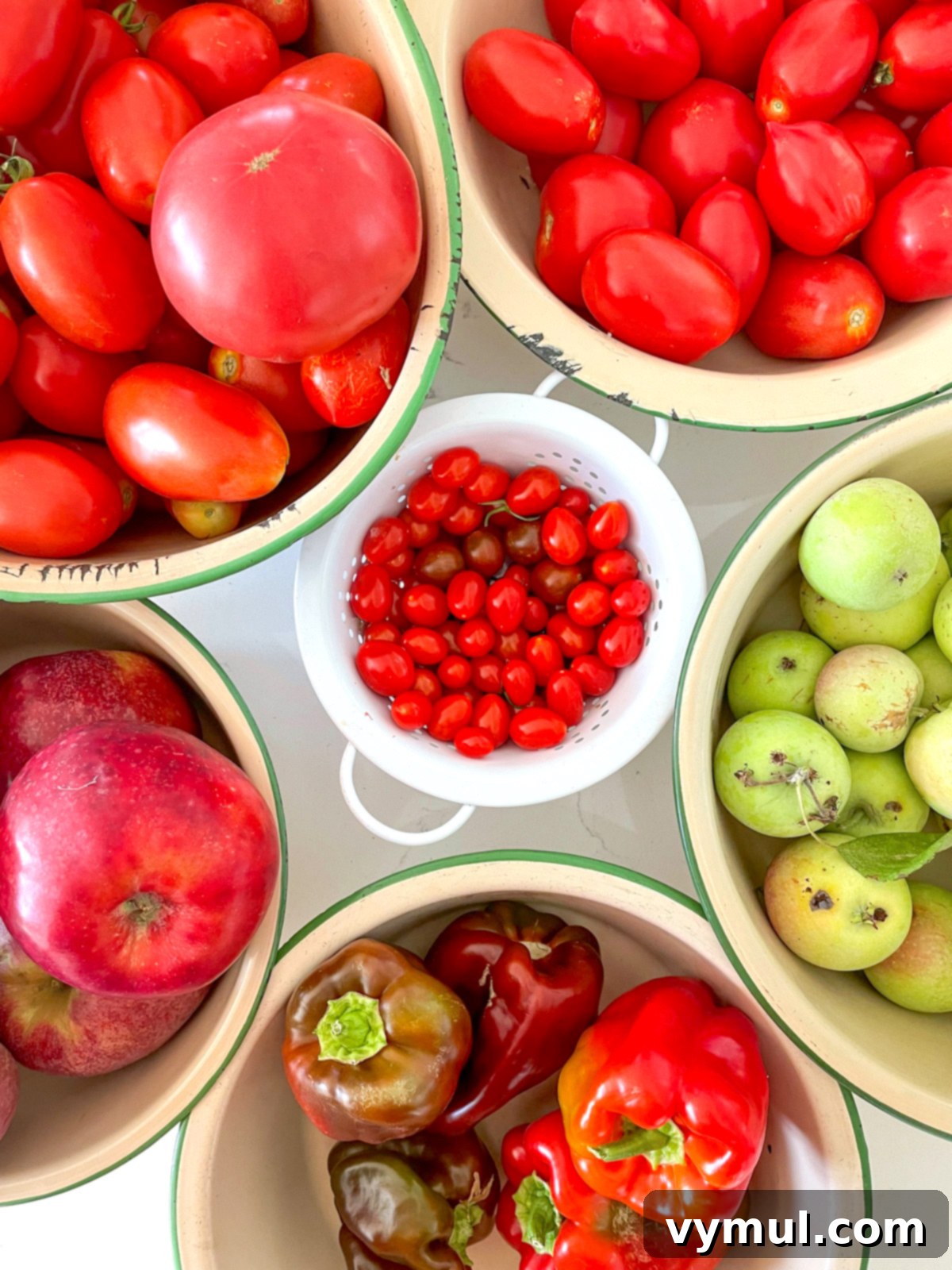 Autumn's Bounty: Garden Gifts, Wellness Essentials, and Enriching Reads 3 bowls of apples, tomatoes, and peppers from above
