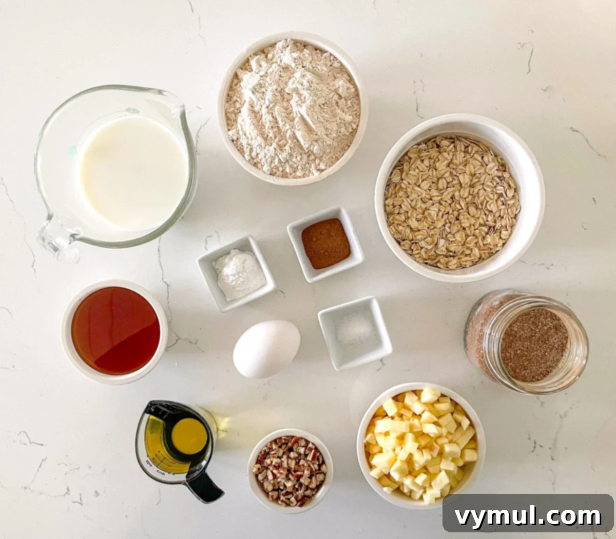Easy Wholesome Honey Cinnamon Apple Oat Loaf 3 Ingredients for apple bread recipe laid out on a wooden surface