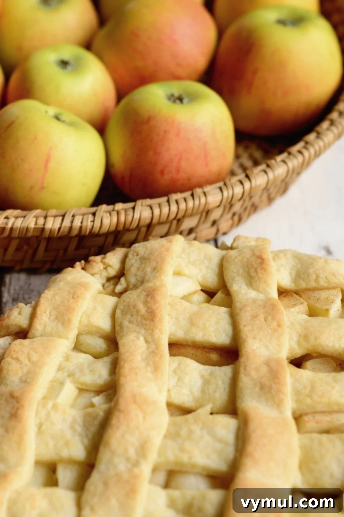 21 Simple Apple Pie Creations 2 bowl of apples with lattice topped pie