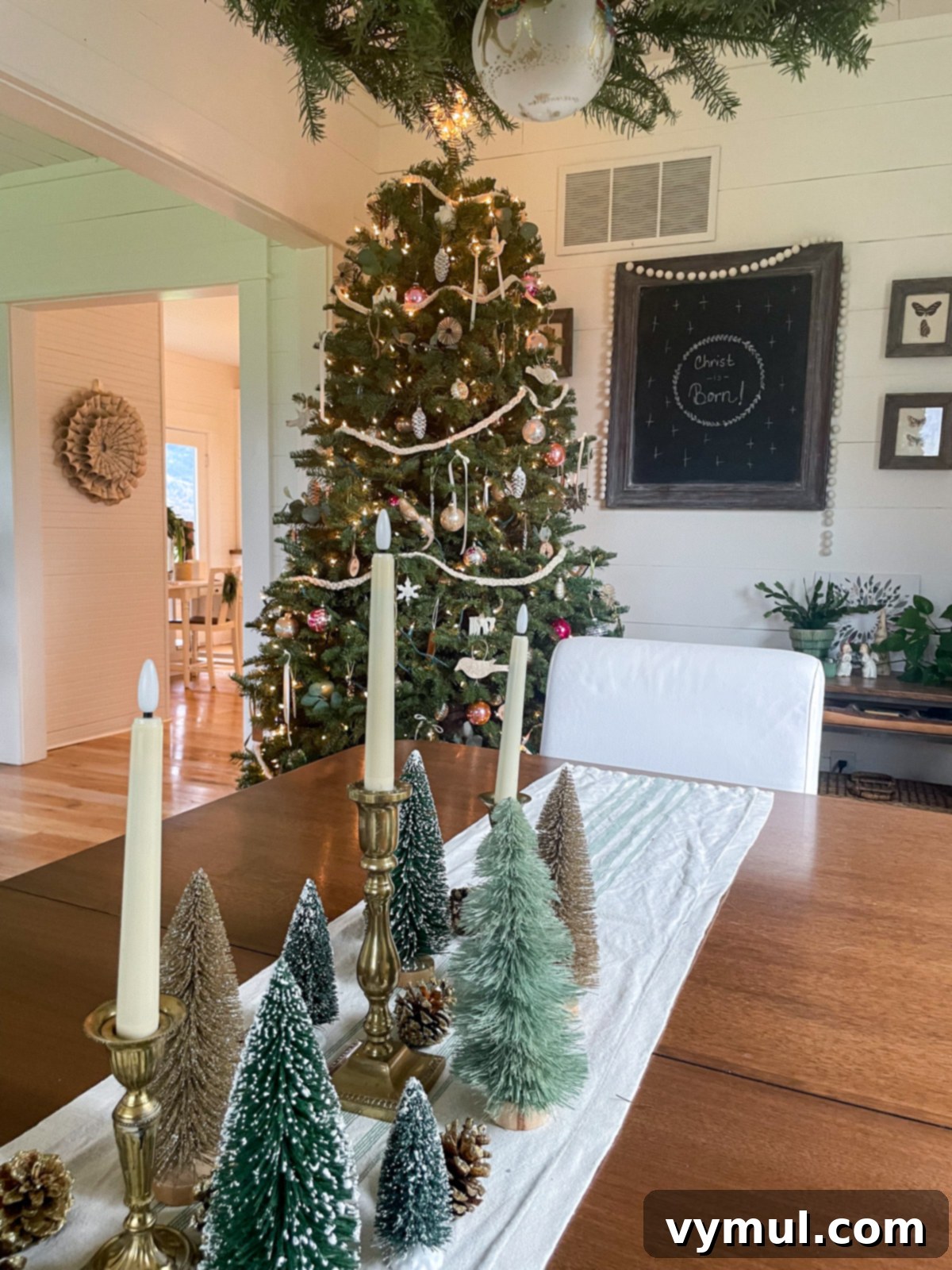Dining room Christmas table decorations and tree
