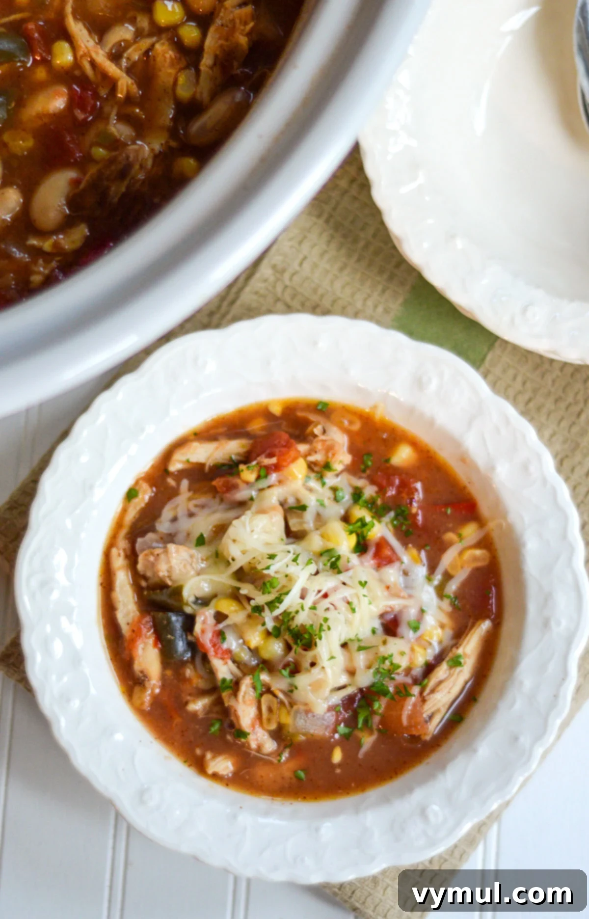 chicken chili in white bowl above