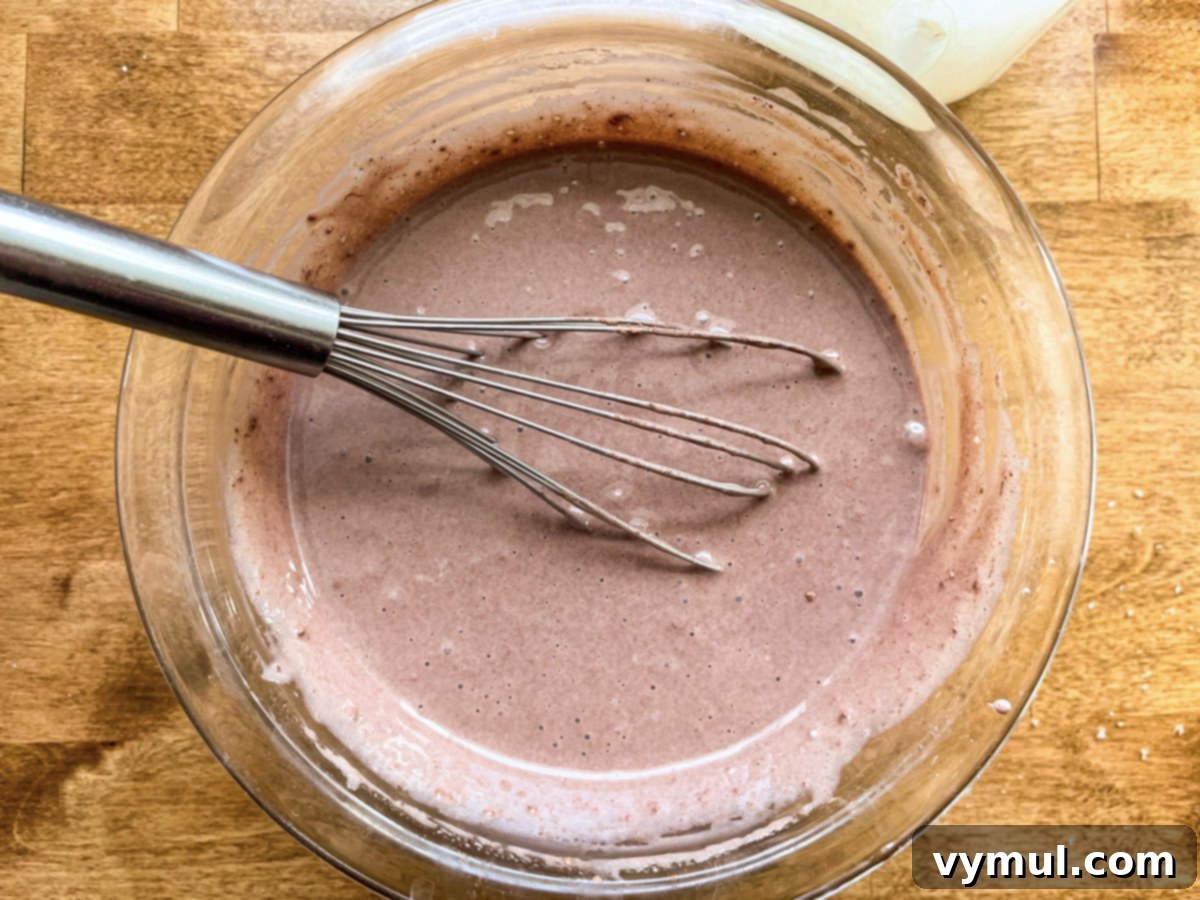 No-Bake Gluten-Free Chocolate Peanut Butter Magic Bars 6 making milk-chocolate layer