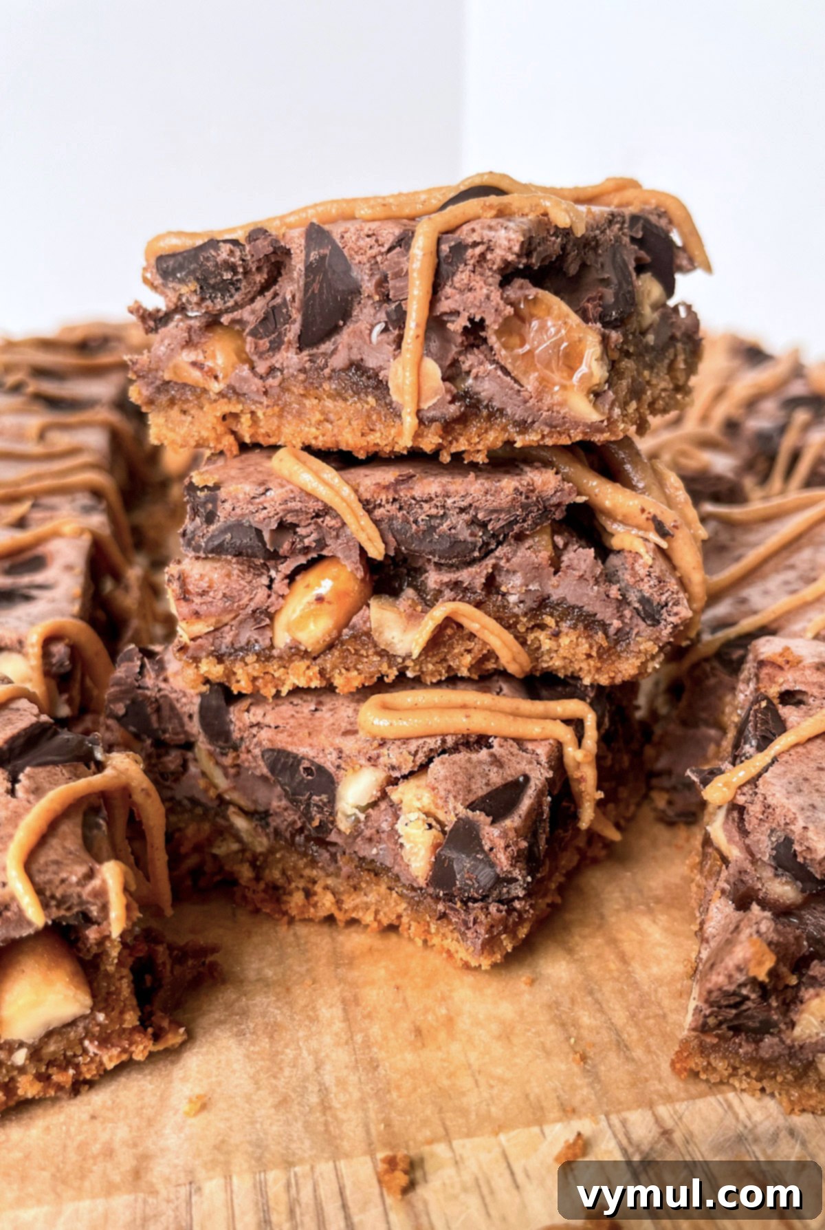 No-Bake Gluten-Free Chocolate Peanut Butter Magic Bars 10 chocolate peanut butter bars stacked