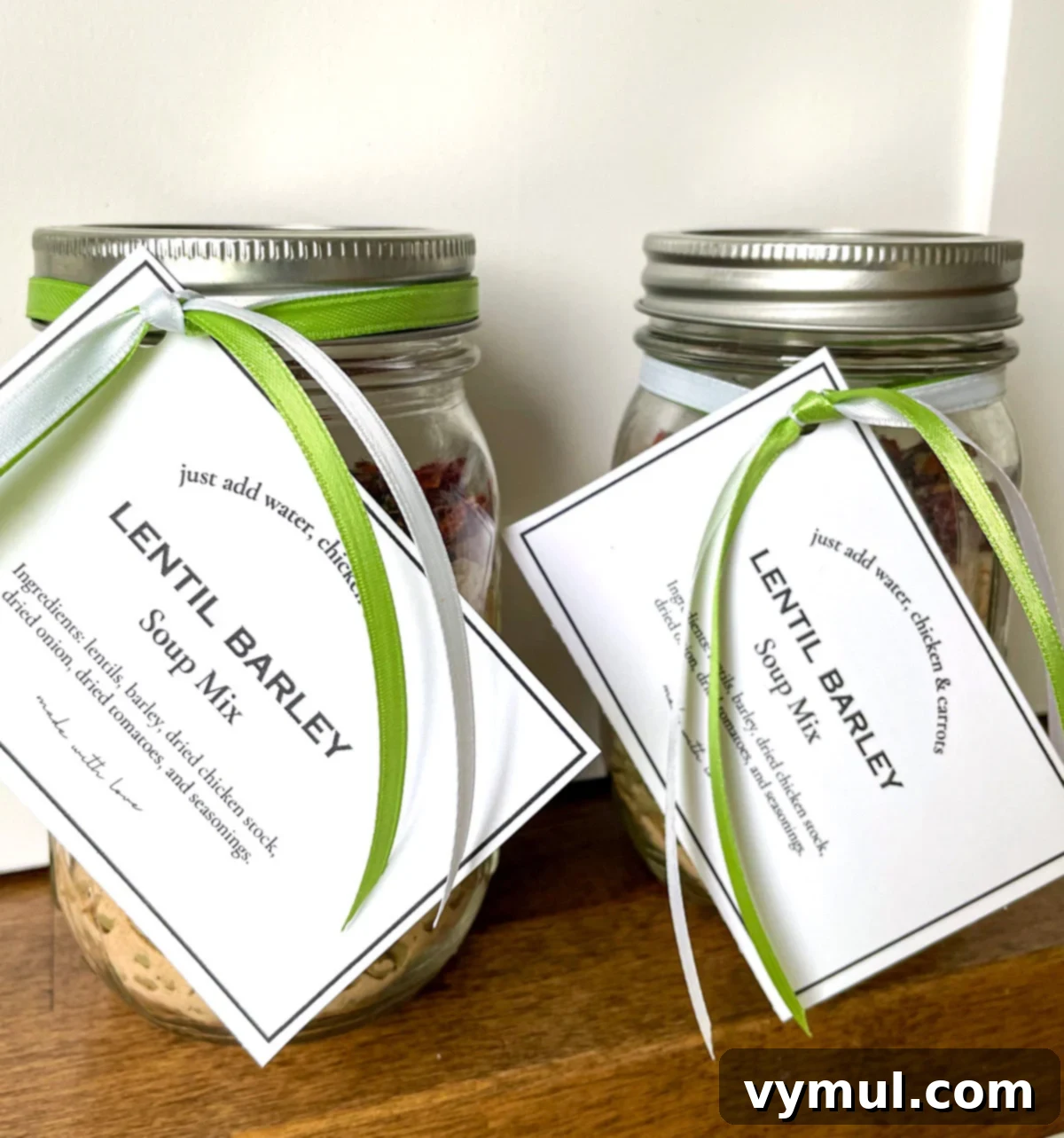 Effortless Homemade Lentil Barley Soup Mix 3 Multiple jars of beautifully layered lentil barley soup mix, each adorned with a charming, instruction-laden label, ready for gifting.