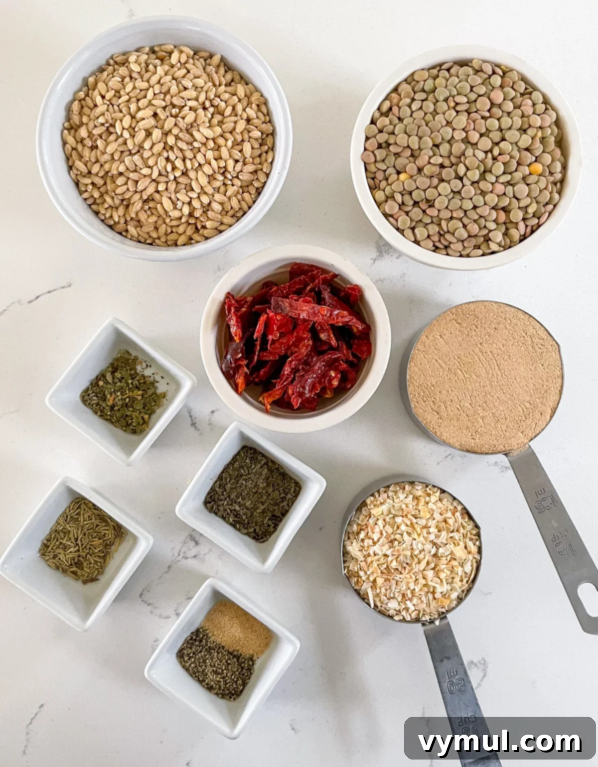 Effortless Homemade Lentil Barley Soup Mix 4 A collection of fresh, wholesome ingredients laid out on a surface, ready to be assembled into the lentil barley soup mix jars.