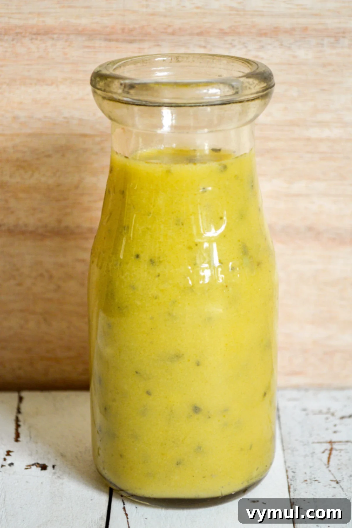 small bottle of lemon vinaigrette dressing