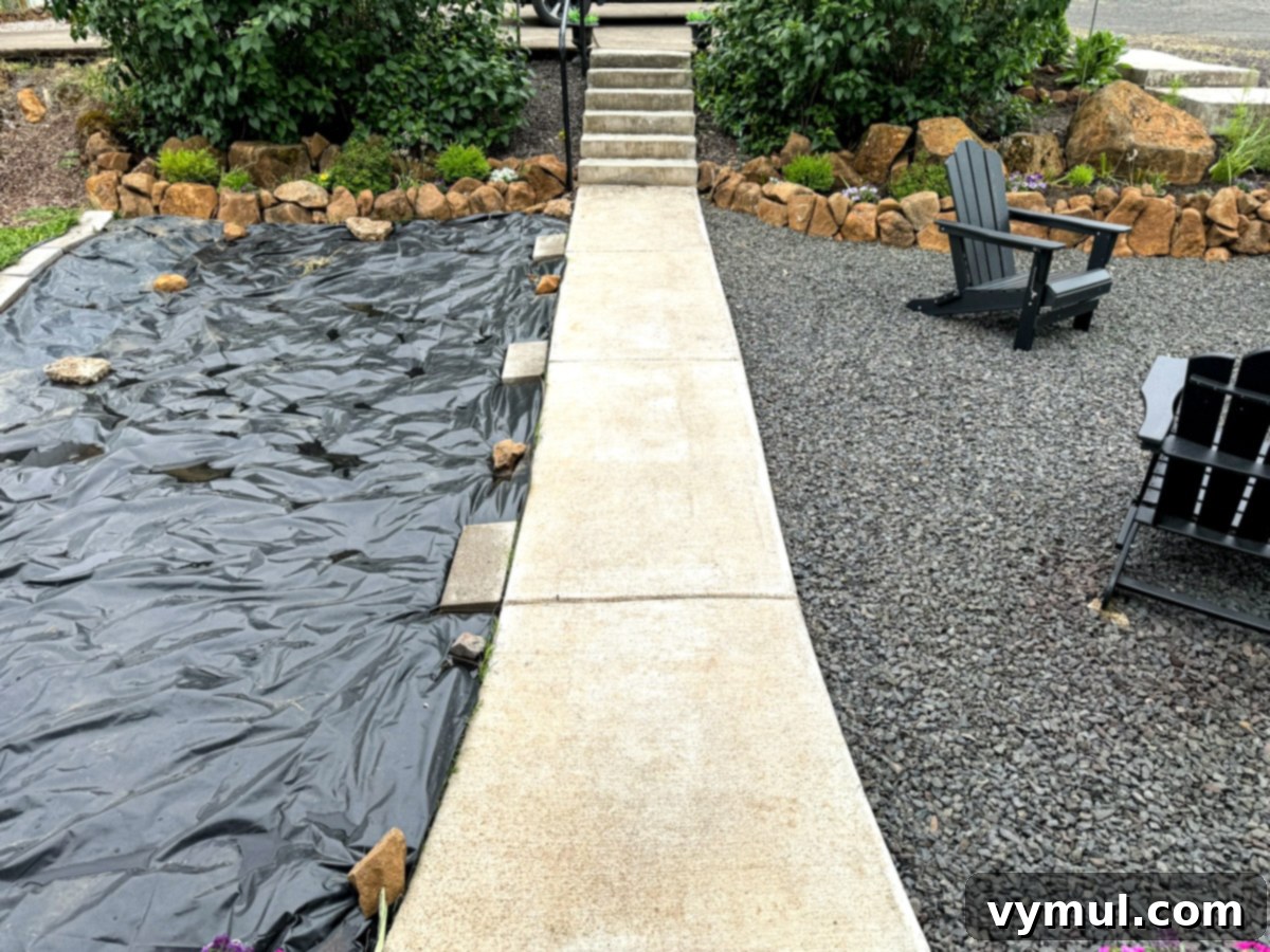 June Essentials: Garden Joy, Healthy Home Hacks, Natural Cleaning, and Our Favorite Books 7 cement path with plastic on one side and gravel on other side