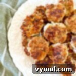 Speedy Wholesome Turkey Patties for Busy Mornings 8 A close-up of a single perfectly cooked healthy turkey breakfast patty, showcasing its delicious texture and inviting golden-brown crust.