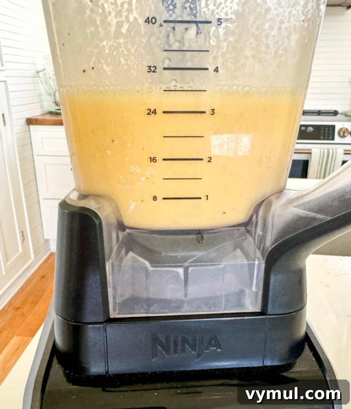 Protein-Packed Make-Ahead Cottage Cheese Eggs 5 Blended egg mixture with cottage cheese, showing a smooth, creamy texture.