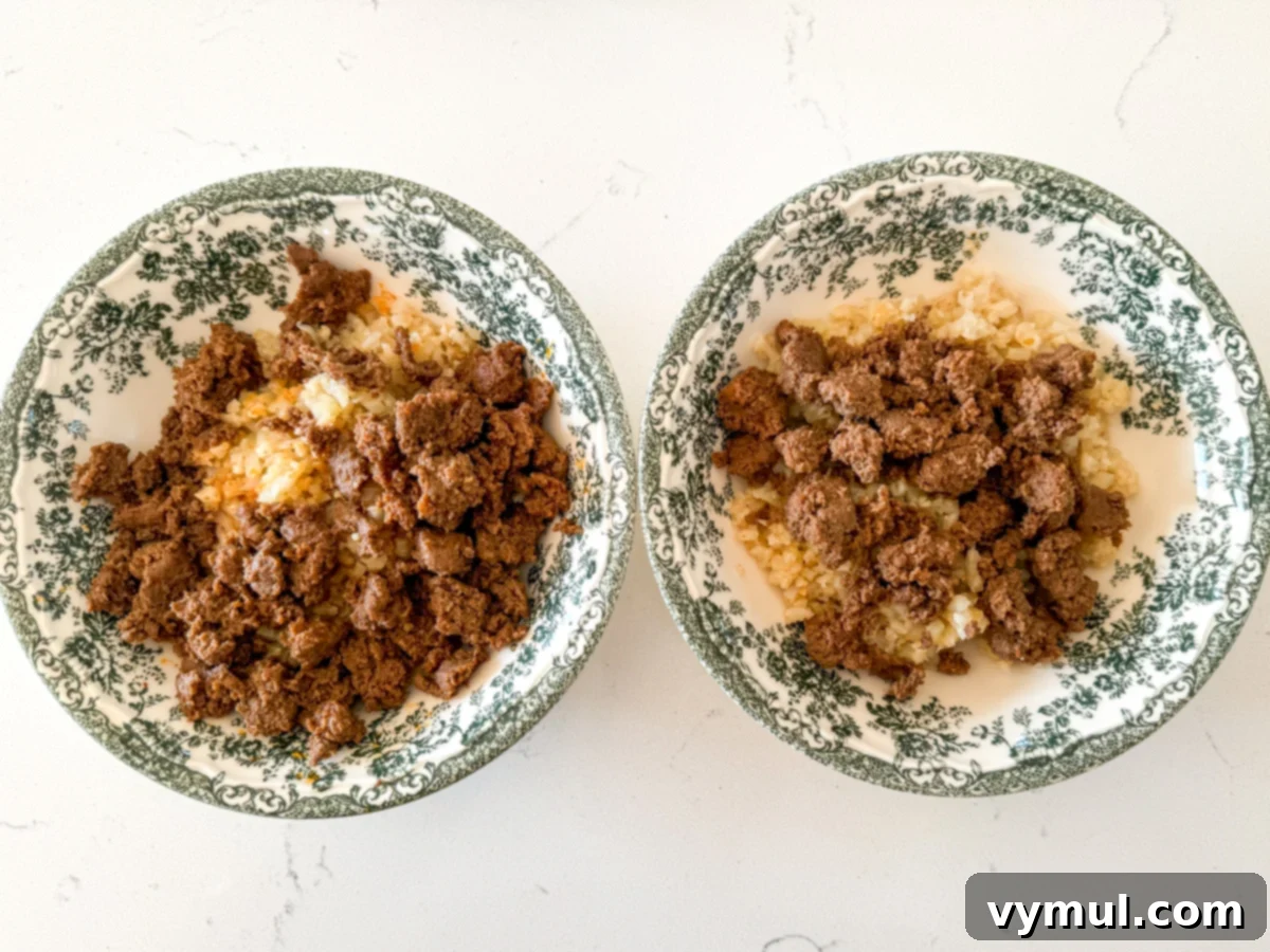 Speedy Six Ingredient High Protein Mexican Breakfast Bowls 4 Cooking ground turkey in a skillet with taco seasoning.