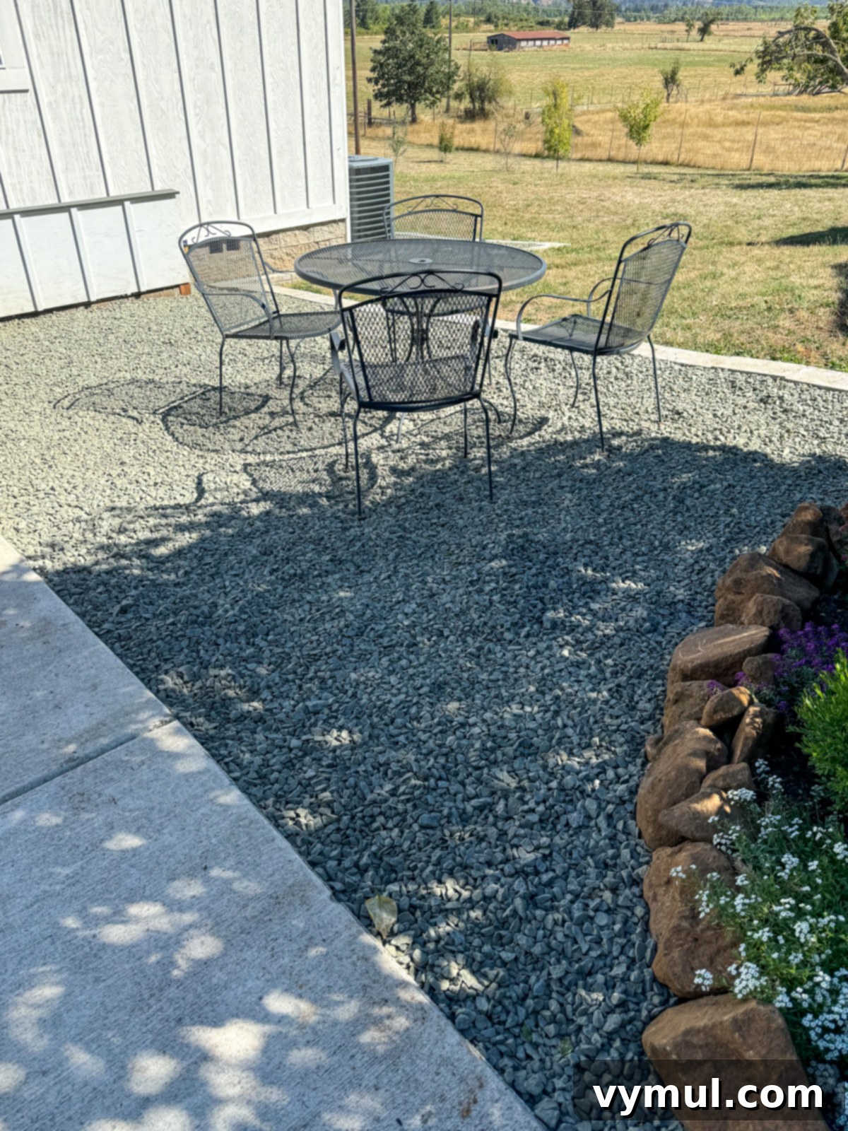 Good Things Lately 76 Garden Wisdom Harvest Joys Kitchen Wins and Reading Picks 3 Freshly graveled patio in garden with table and chairs