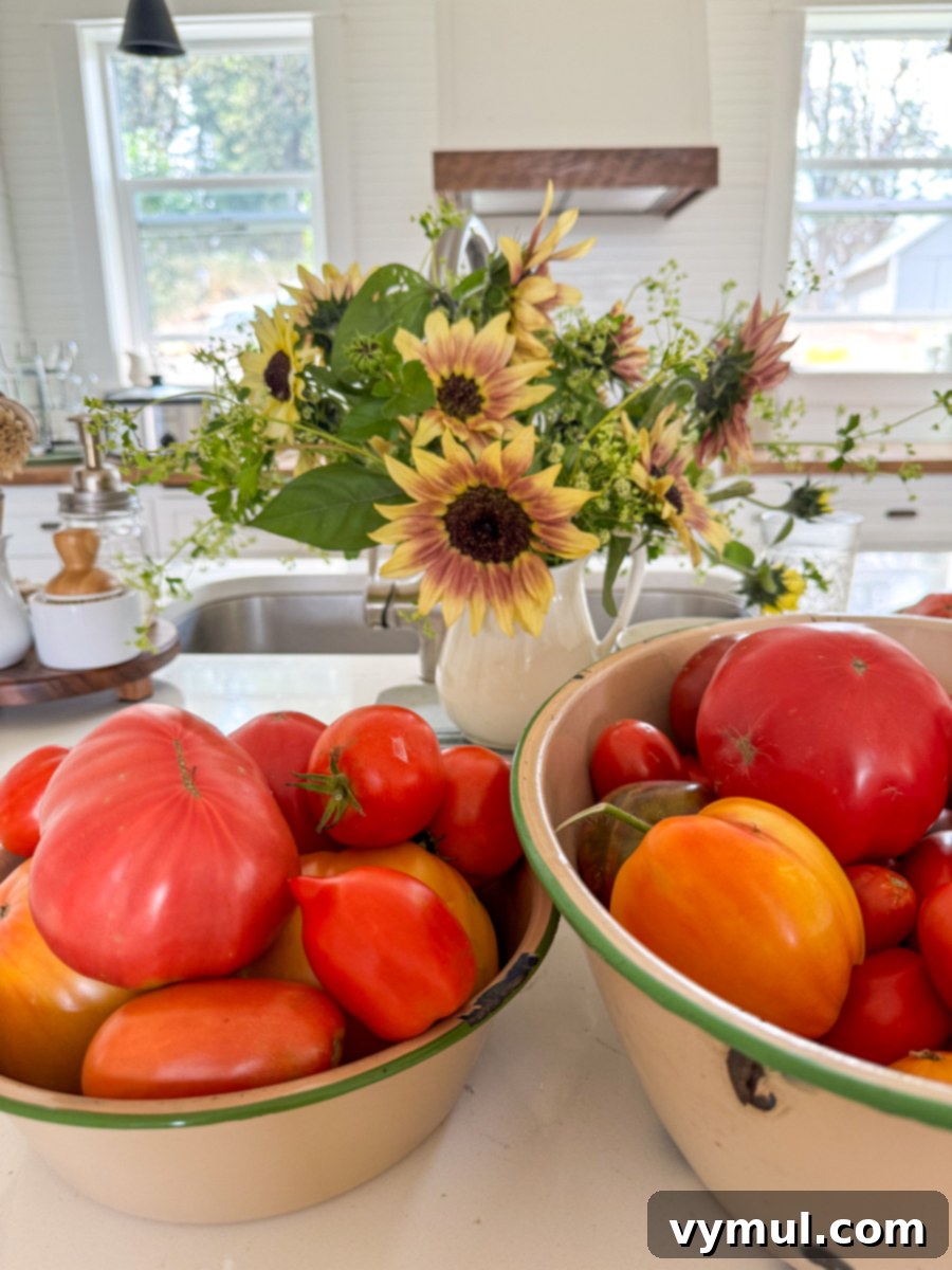 Entry 77: Crescent City Explorations, Barn Makeover, Preserved Victories, Recent Reads & Beyond 11 a vase of sunflowers and bowls of tomatoes
