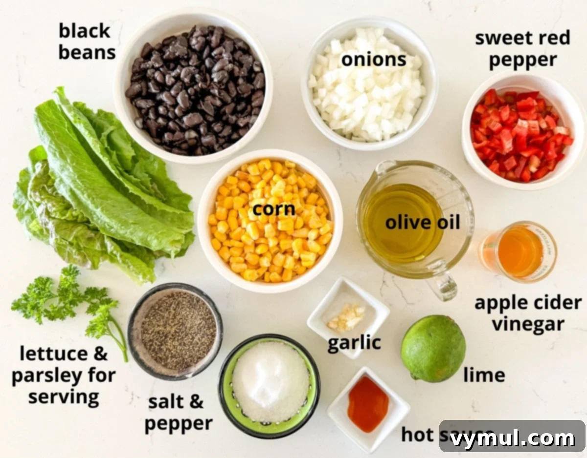 Zesty 10 Minute Black Bean and Corn Salad 3 black bean salad ingredients on a marble background