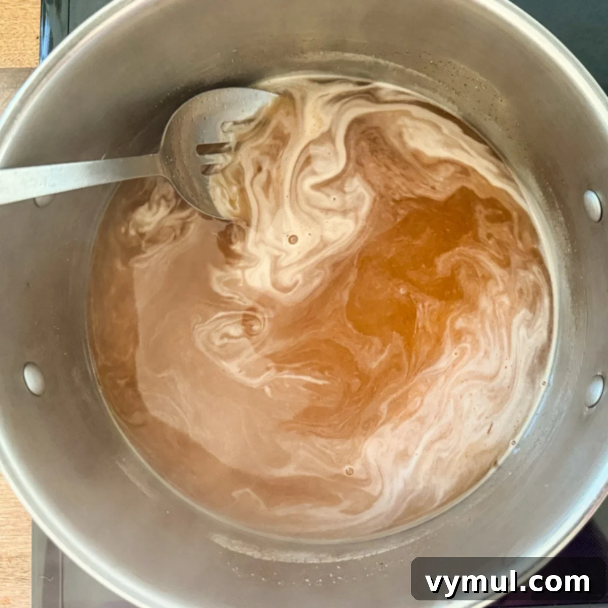 Sweet and Spicy Lower Sugar Cowboy Candy for Easy Canning 5 Cooking down syrup for candied jalapeños