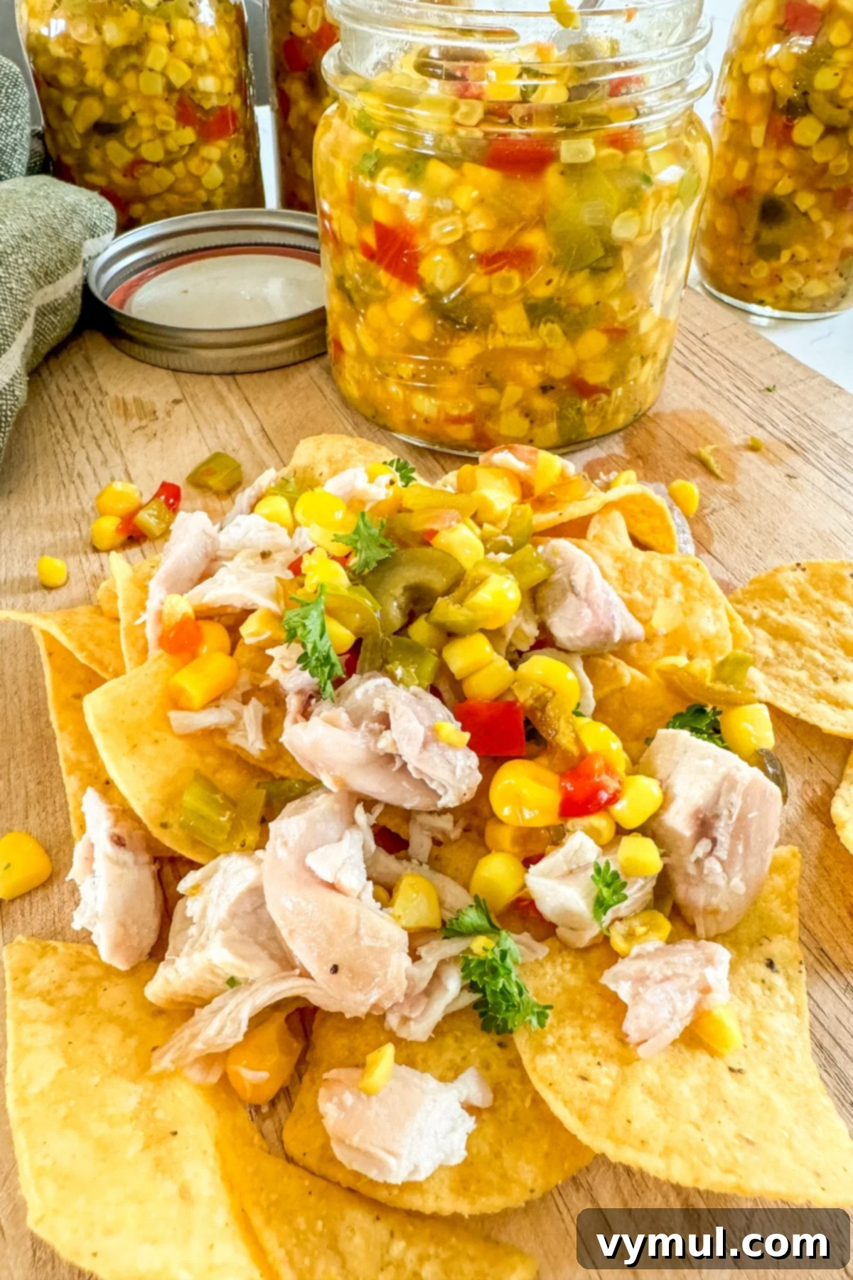 Spicy Olive Corn Relish: Water Bath Canning 6 corn relish on top of chicken nachos