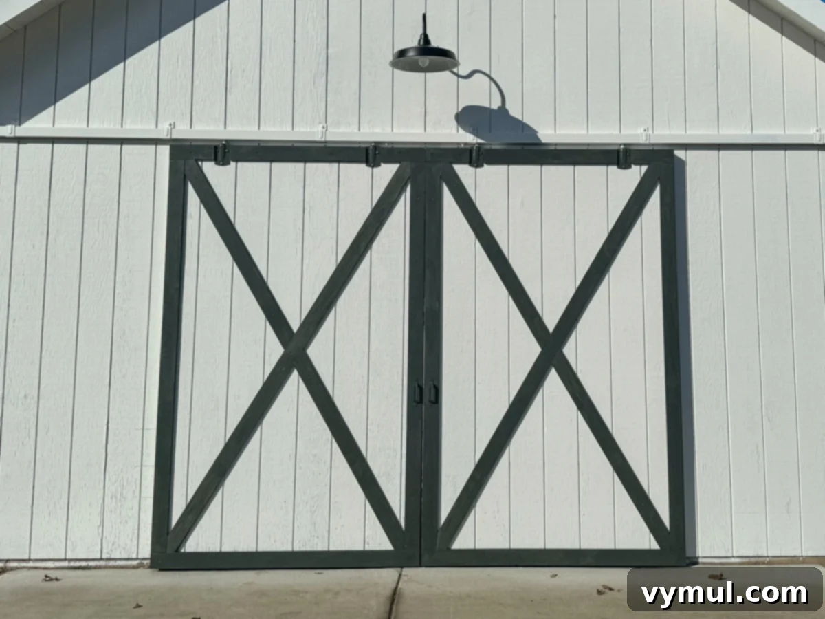 Effortless Barn Exterior Update 17 barn doors with green wood trim