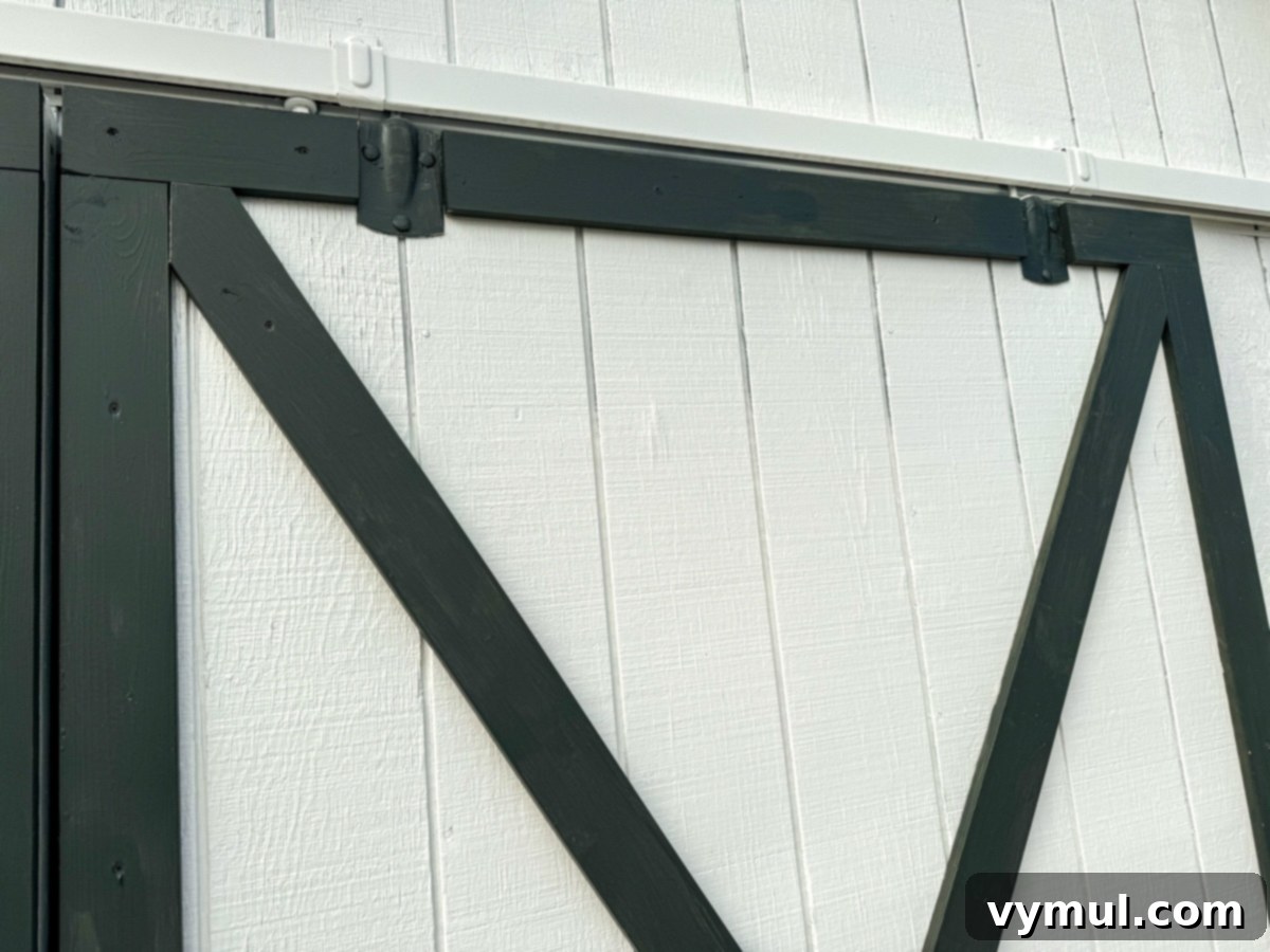 Effortless Barn Exterior Update 18 close up of barn door trim details