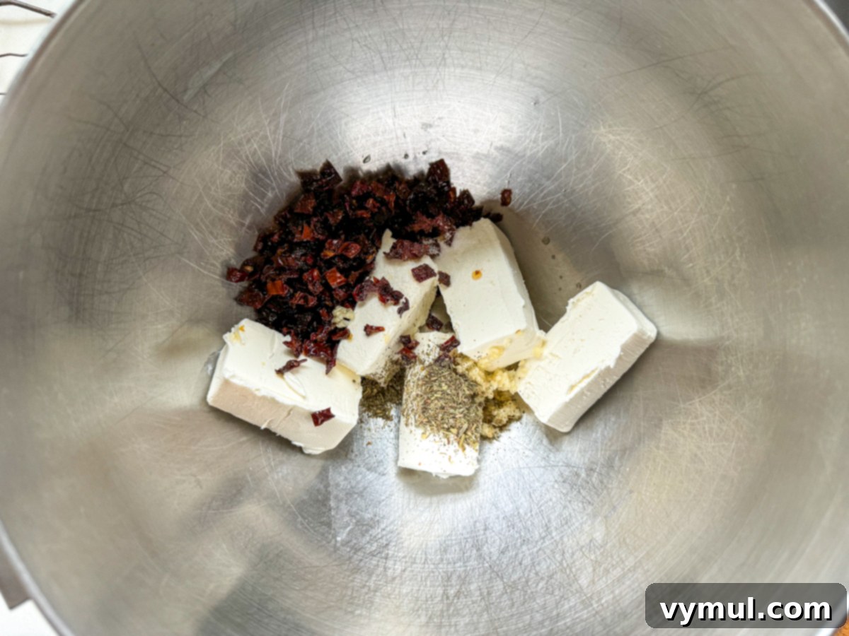 5 Minute Sun Dried Tomato Cheese Ball Quick and Nut Free 4 cheese ball ingredients in mixing bowl