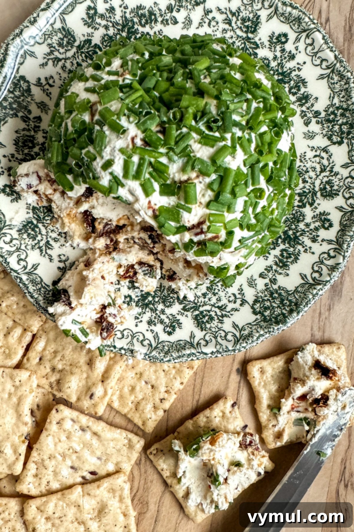 5 Minute Sun Dried Tomato Cheese Ball Quick and Nut Free 8 cheese spread on crackers