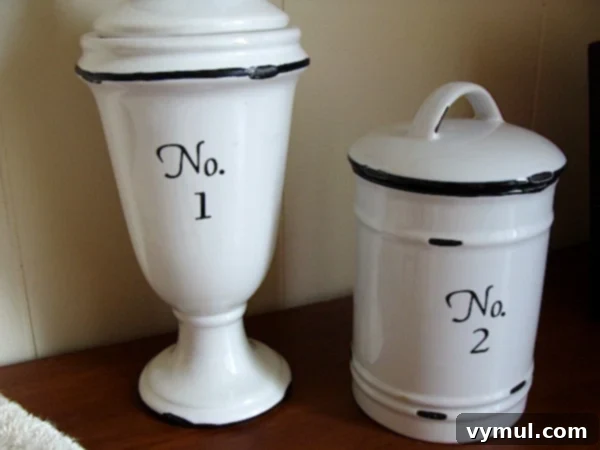 Thrift Store Apothecary Jar Revival 6 Two transformed apothecary jars with elegant numbers, resembling high-end decor