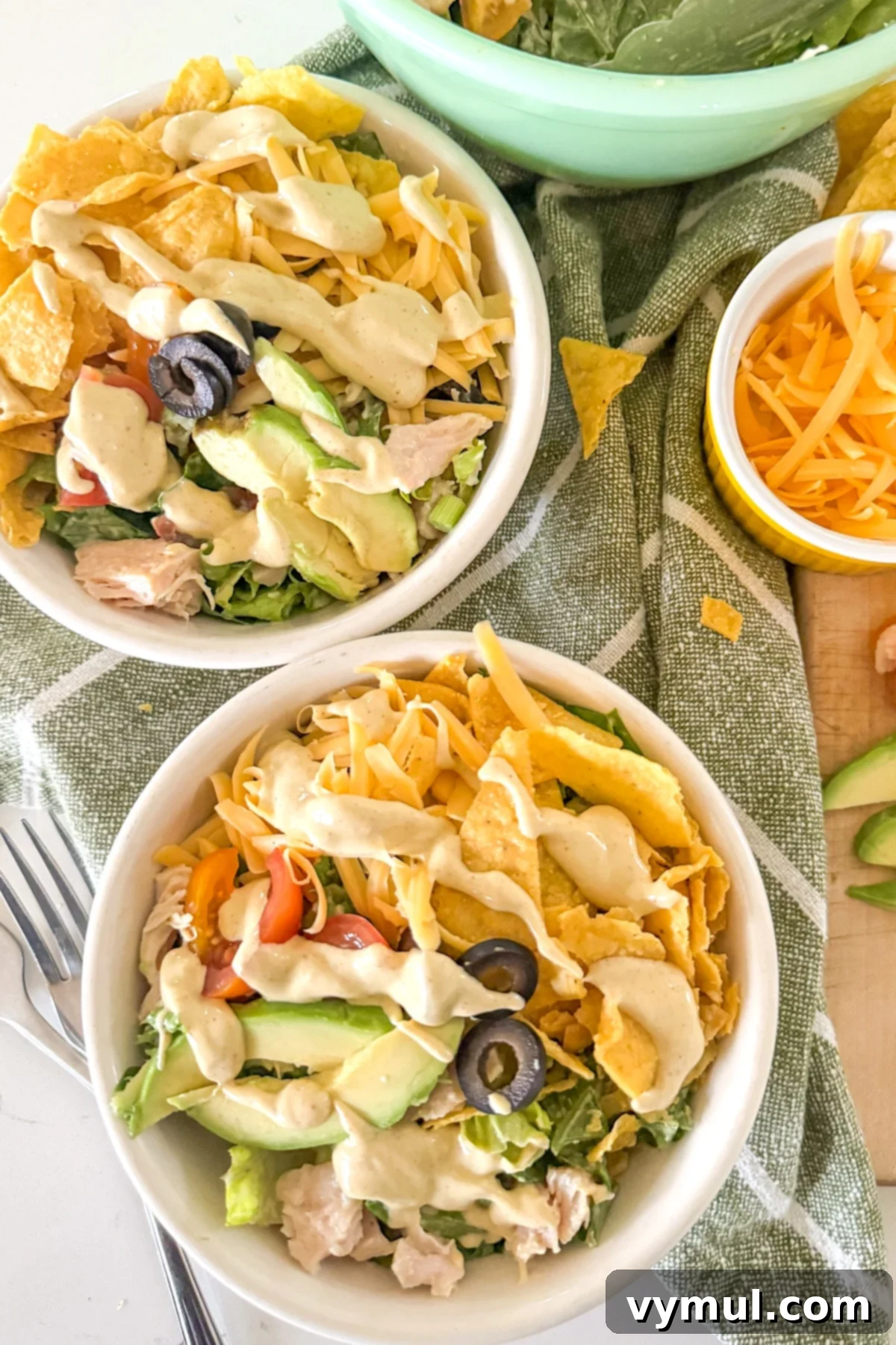 15-Minute Fiesta: Creamy Avocado Salad with Zesty Avocado Dressing 2 bowls of avocado salad from above