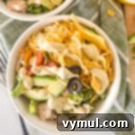 15-Minute Fiesta: Creamy Avocado Salad with Zesty Avocado Dressing 8 avocado bowl with avocado dressing drizzle