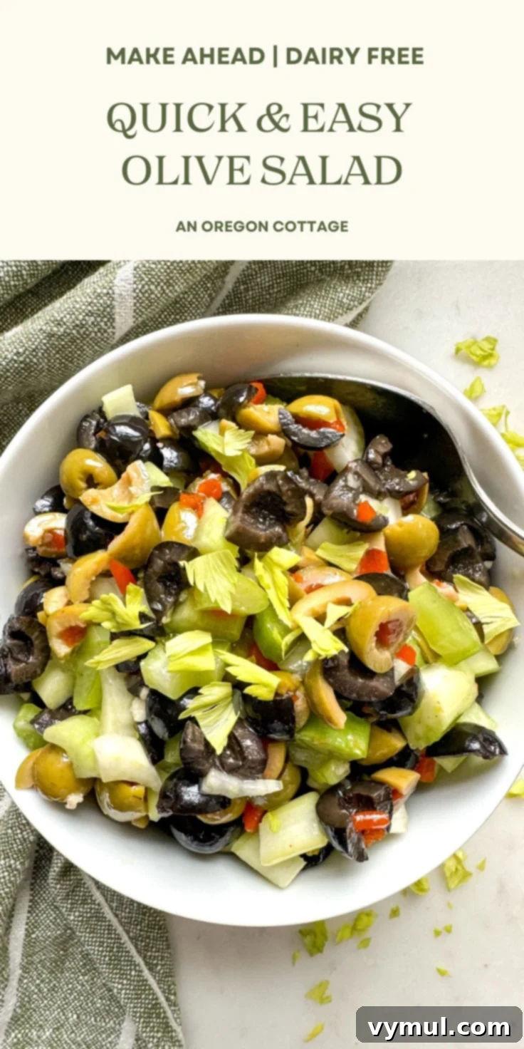 Effortless Olive Salad, Maximum Flavor 8 A tall Pinterest-optimized image featuring the olive salad, suitable for sharing on social media, with descriptive text overlaid.