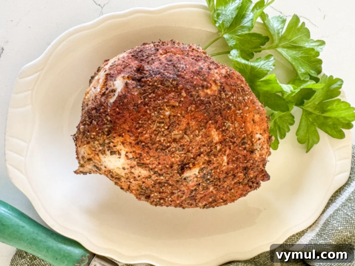 cooked pork sirloin roast on white plate