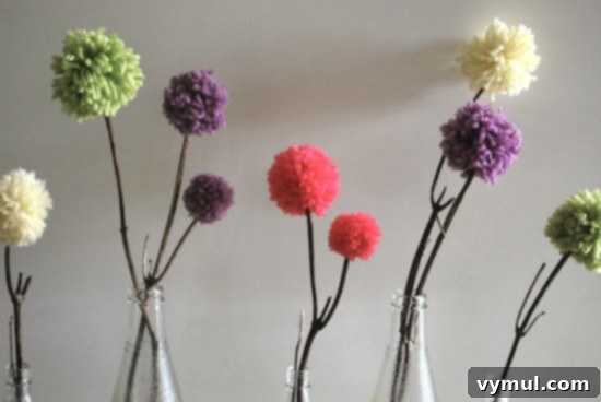 Easy and Adorable Pom Pom Flowers for Spring 6 Artistic shot of pom pom flowers in an interior setting