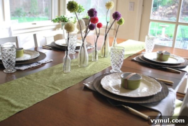 Easy and Adorable Pom Pom Flowers for Spring 8 Spring dining table setting with pom-pom flowers and natural light