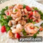 Effortless 15-Minute White Bean Salad with Shrimp or Chicken 7 white bean salad with shrimp on white plate