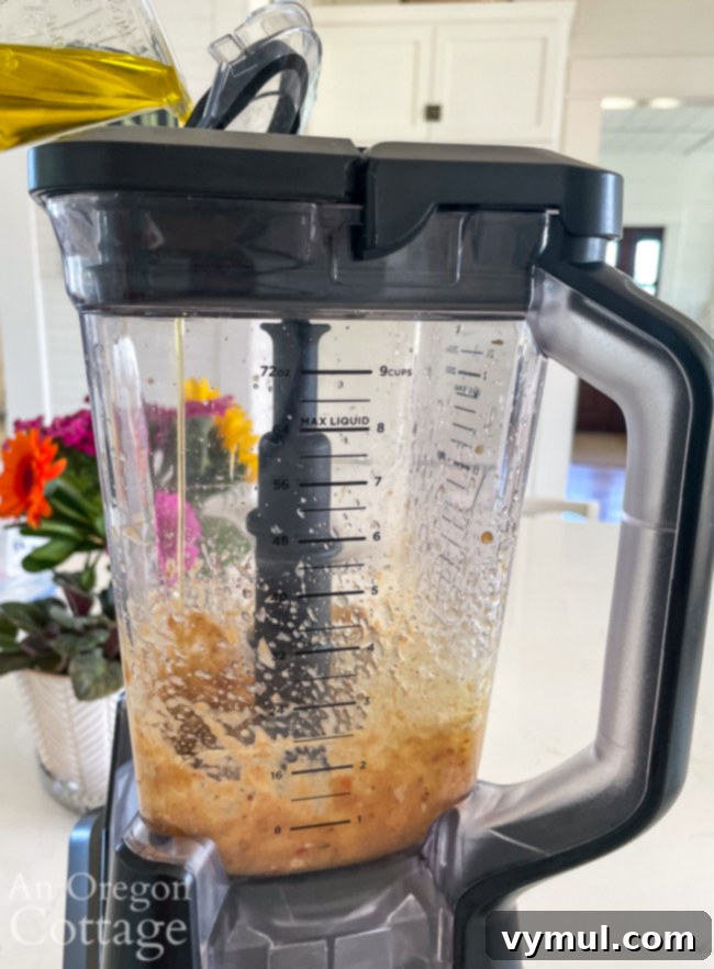 Adding oil slowly to chutney salad dressing