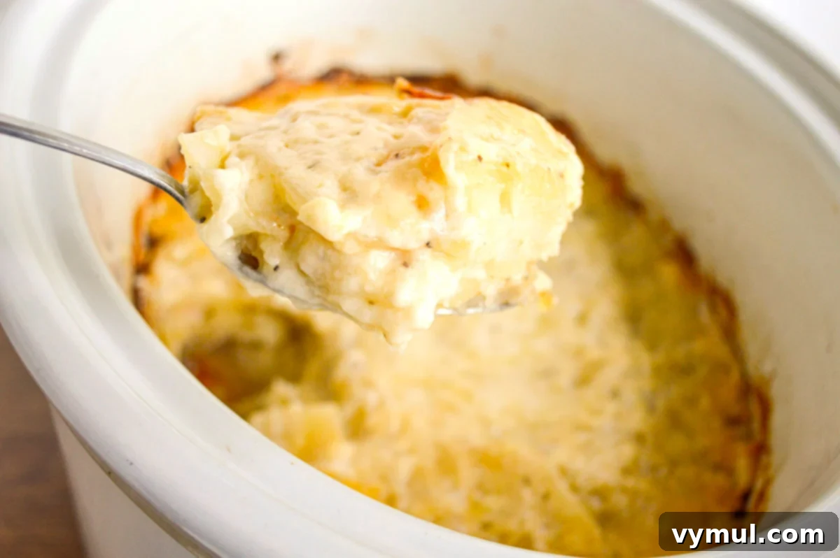 Irresistible Slow Cooker Cheesy Garlic Scalloped Potatoes 9 serving scalloped potatoes