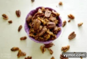 Bowl of Easy Healthy No-Sugar Spiced Nuts, perfect for a low-carb snack.