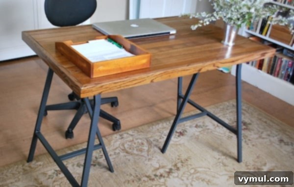 Ikea Trestle Desk: Upcycling Old Flooring for a Stylish Workspace 3 Salvaged Wood Desk Front