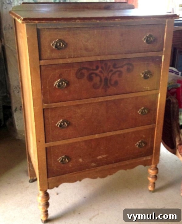 Antique dresser before restoration with visible wear and tear