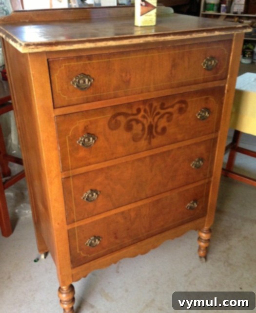 Partially restored antique dresser, showing the contrast between finished and unfinished sections