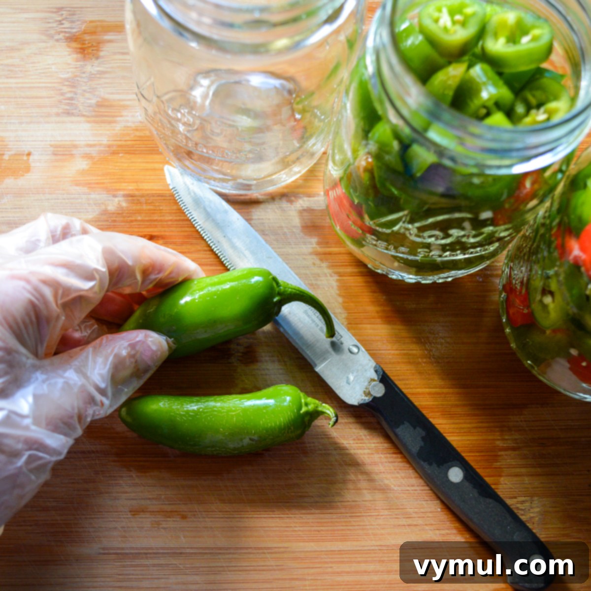 cutting jalapeños with a glove