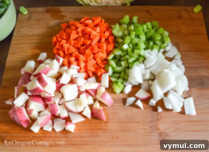 Revitalizing Chicken Vegetable Bone Broth Soup 5 chopped vegetables on cutting board